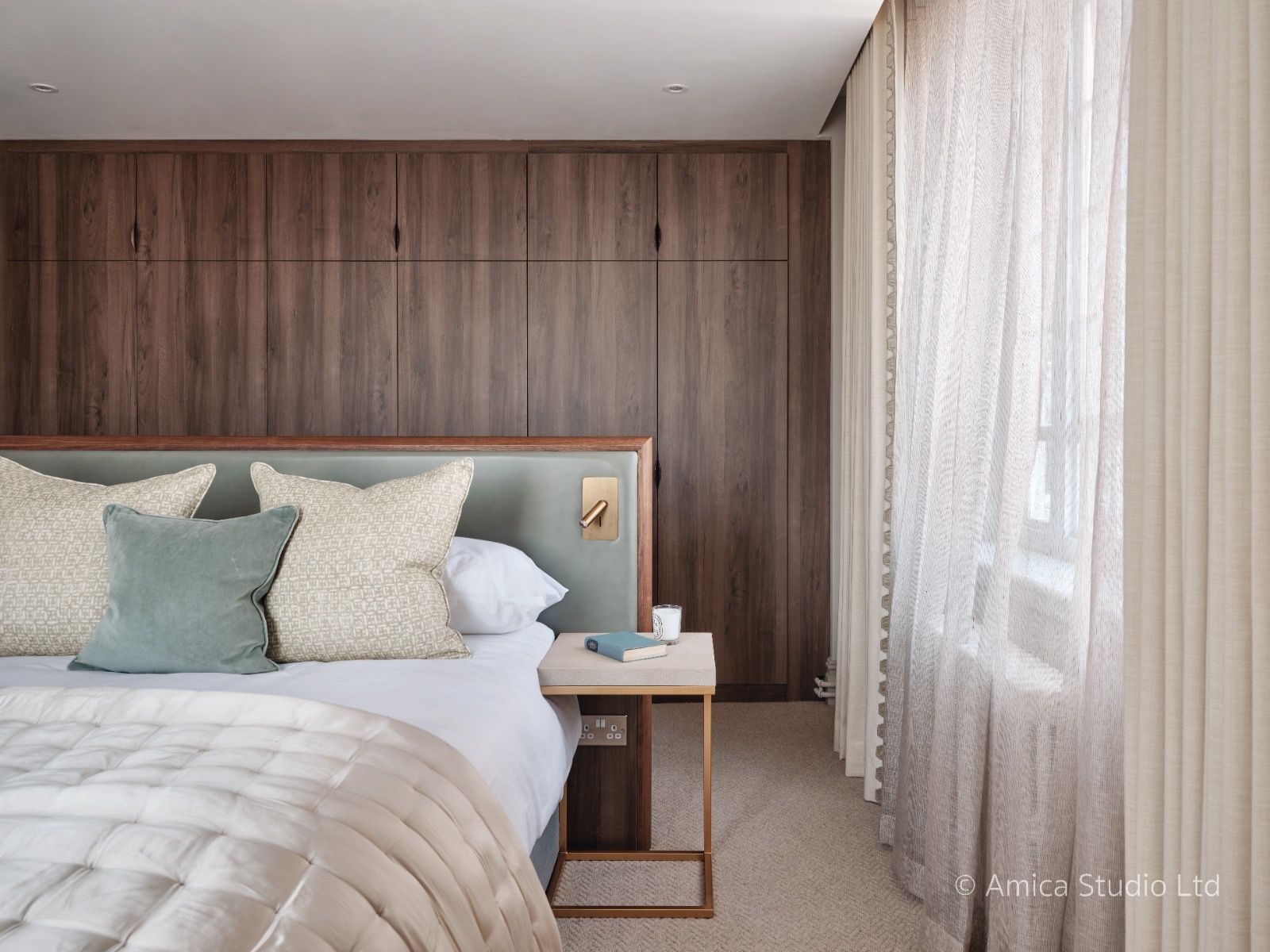 Bedroom with full-height timber panelling